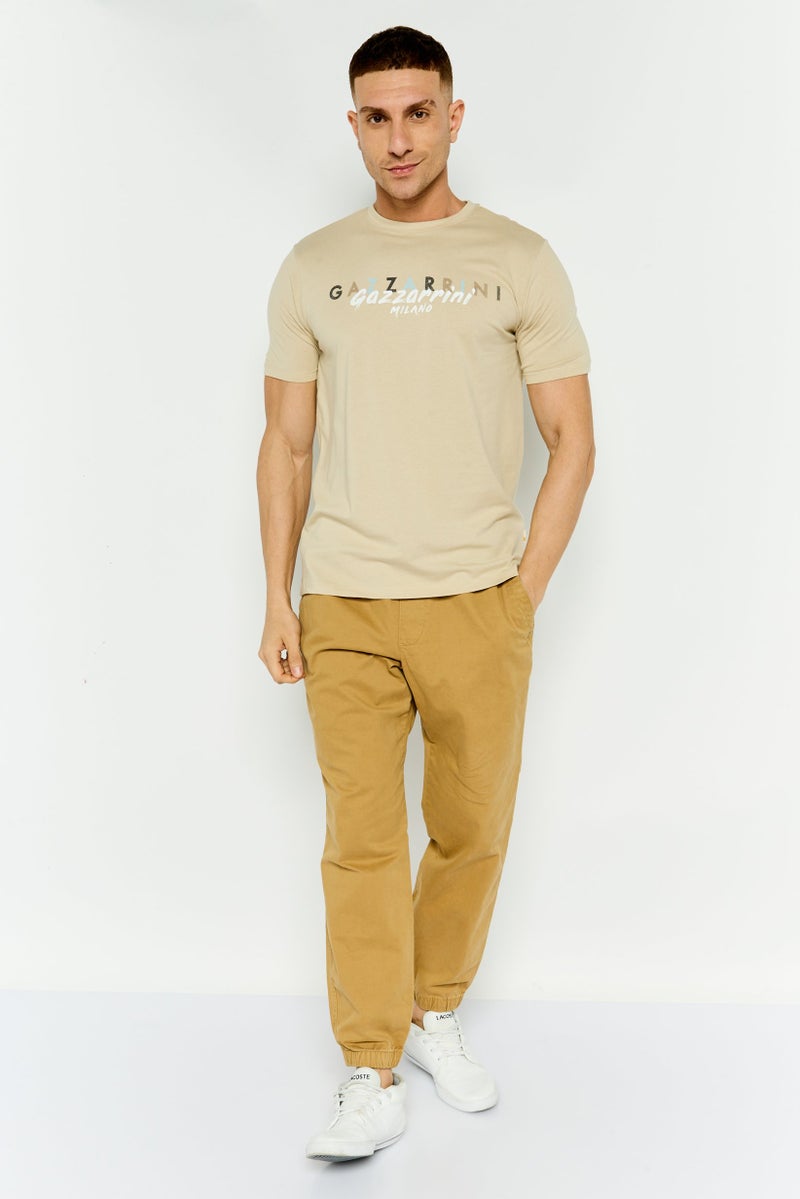 Gazzarrini تي شيرت رجالي بأكمام قصيرة وياقة دائرية، مطبوع برسومات، بيج - Image 4